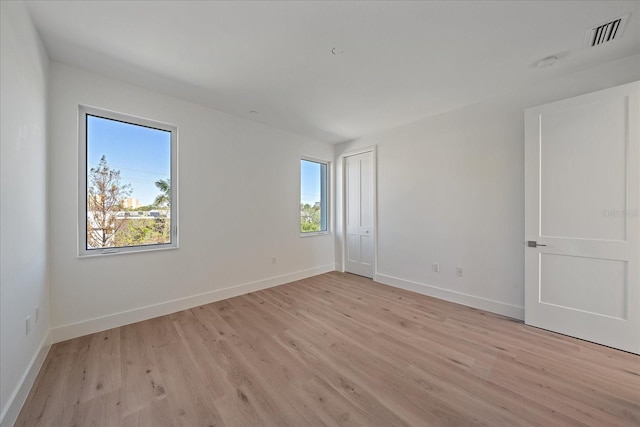 empty room featuring light hardwood / wood-style floors