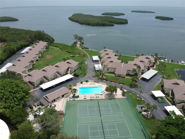 birds eye view of property featuring a water view and a residential view