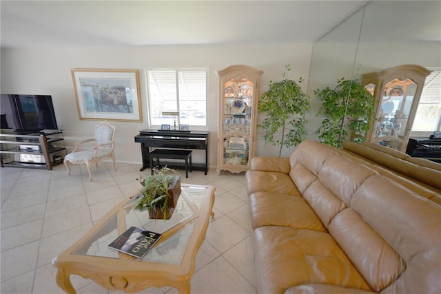 living area featuring light tile patterned floors