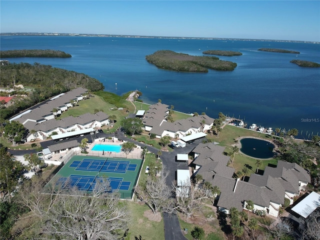 drone / aerial view featuring a residential view and a water view