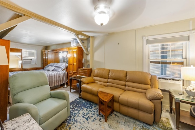 bedroom with light wood-type flooring and cooling unit