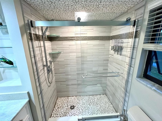 bathroom with vanity and walk in shower