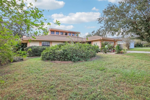 view of front of house with a front yard