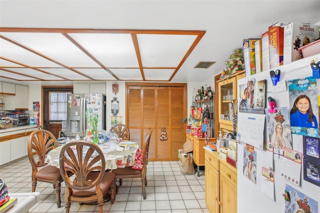 dining room with light tile patterned floors