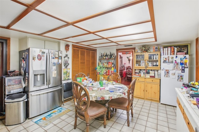 dining space with light tile patterned floors