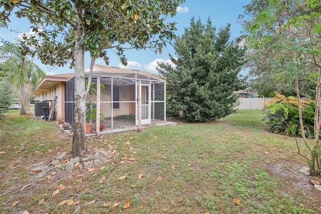 view of yard featuring a lanai