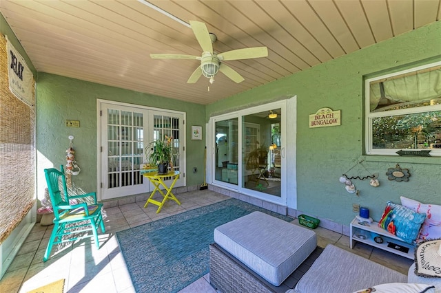 view of patio / terrace featuring ceiling fan