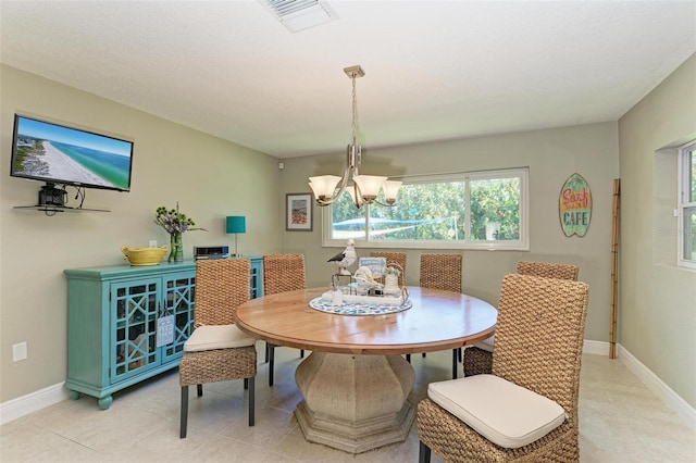 dining space with breakfast area, a healthy amount of sunlight, visible vents, and light tile patterned floors