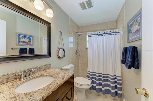 bathroom with vanity, visible vents, a shower with shower curtain, and toilet