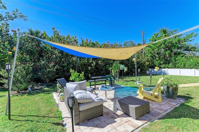 view of patio with outdoor lounge area and fence