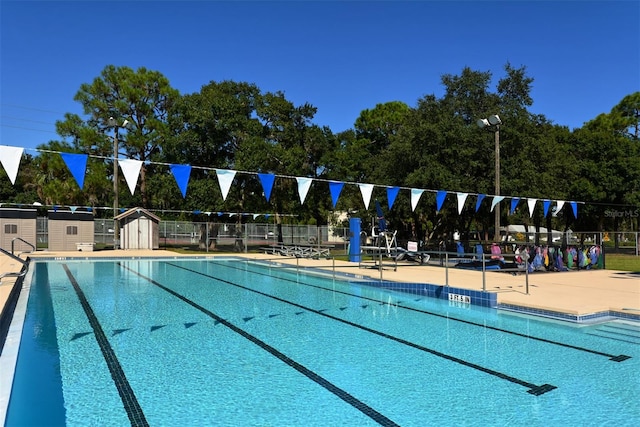 view of swimming pool featuring a patio