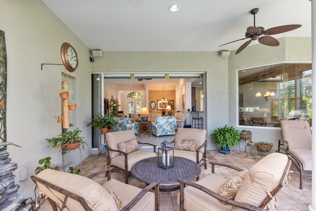 view of patio with ceiling fan and an outdoor hangout area