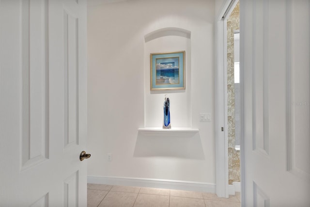 bathroom with tile patterned floors