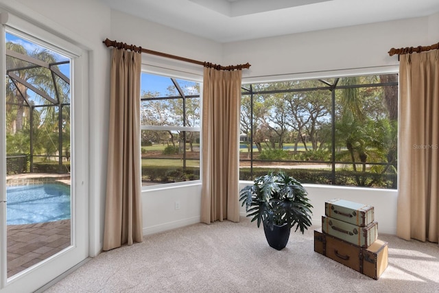 sitting room featuring light carpet