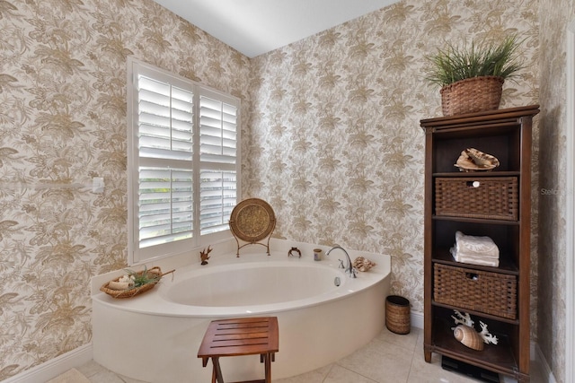 bathroom featuring tile patterned flooring and a tub