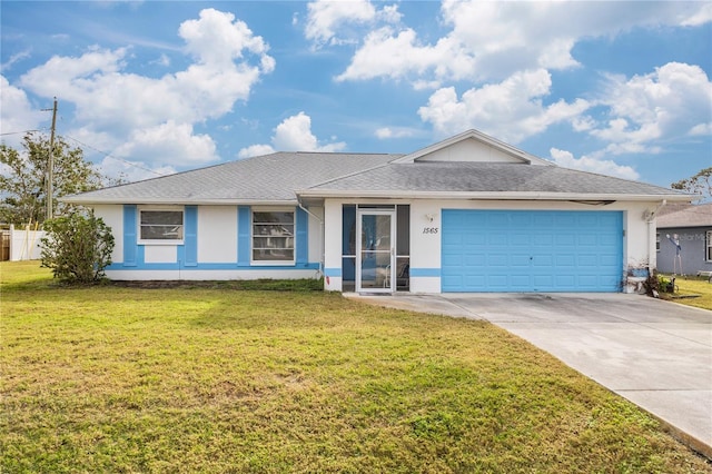 ranch-style home featuring a front lawn and a garage