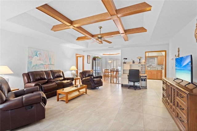 tiled living room with ceiling fan, beamed ceiling, and coffered ceiling