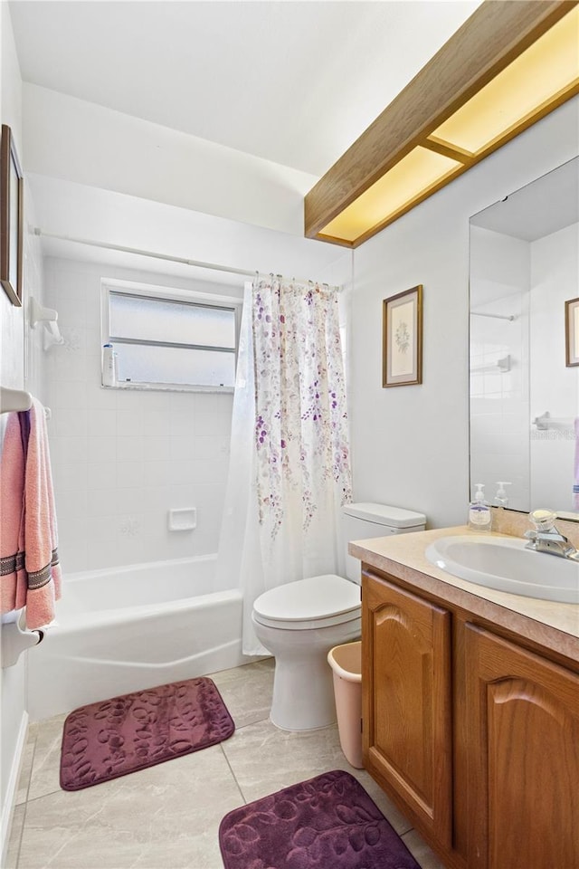 full bathroom featuring toilet, shower / tub combo, vanity, and tile patterned floors