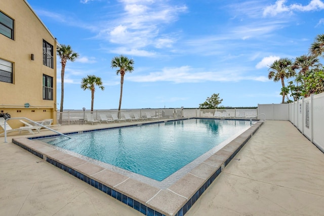 view of pool featuring a patio