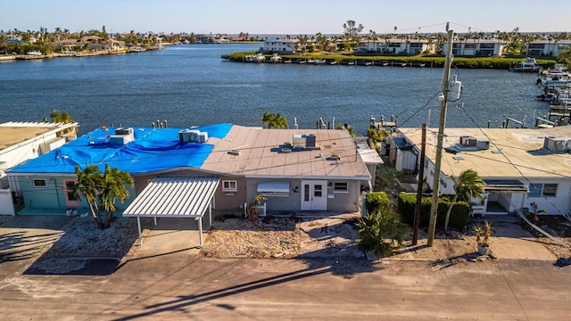 drone / aerial view with a water view