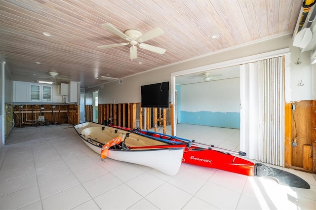 playroom with ceiling fan and wooden ceiling