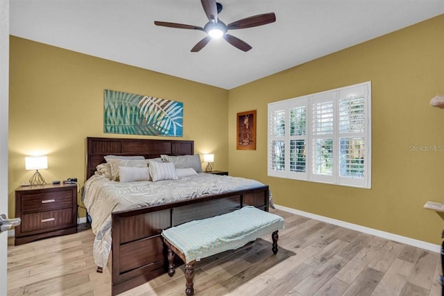 bedroom featuring ceiling fan and light hardwood / wood-style flooring