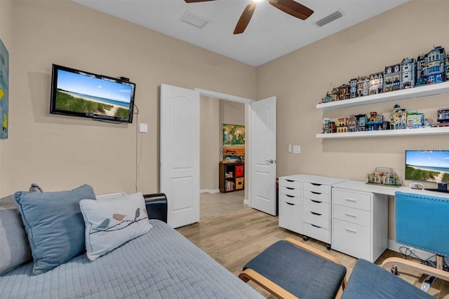 bedroom featuring ceiling fan and light hardwood / wood-style flooring