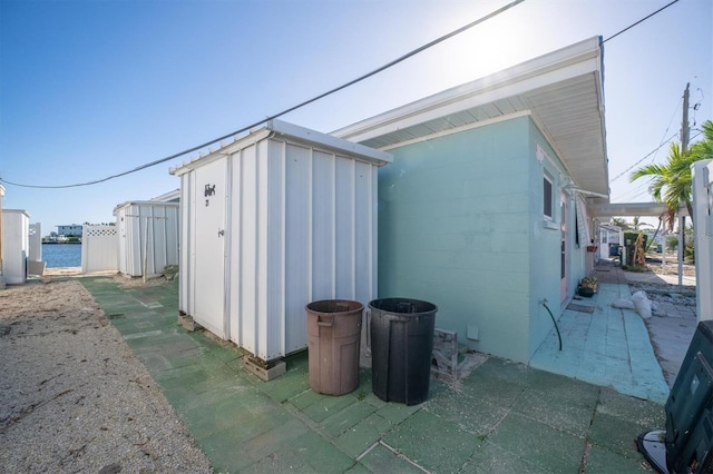 view of side of home featuring a patio