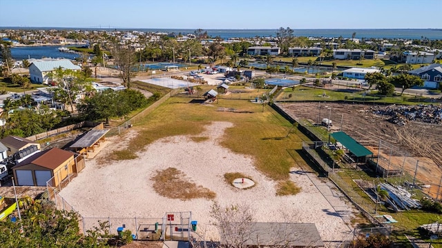 bird's eye view with a water view