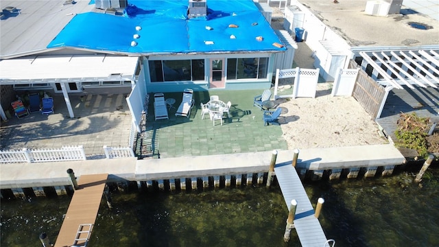 exterior space featuring central air condition unit and a patio area