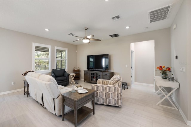 living room with ceiling fan