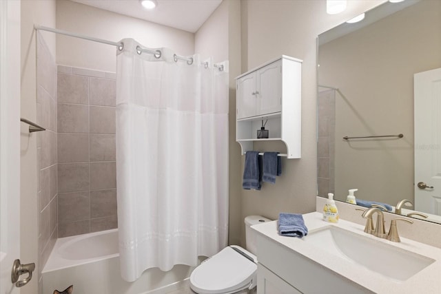 full bathroom with vanity, shower / bathtub combination with curtain, and toilet