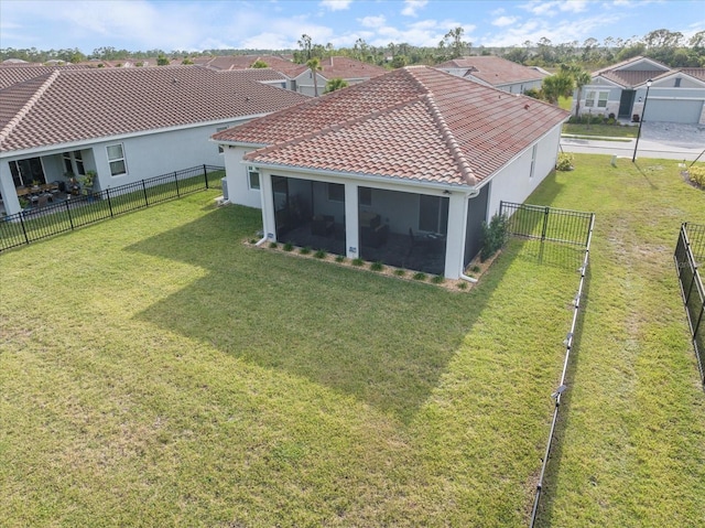 view of yard with a sunroom