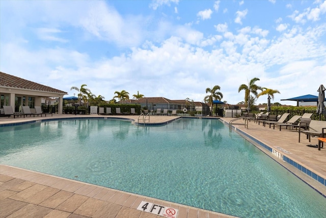 view of pool with a patio