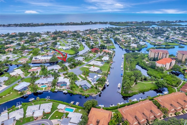 bird's eye view with a water view