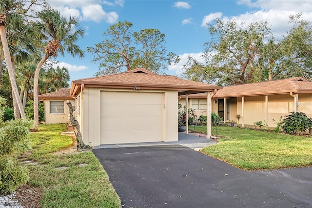 ranch-style house with a front yard and a garage