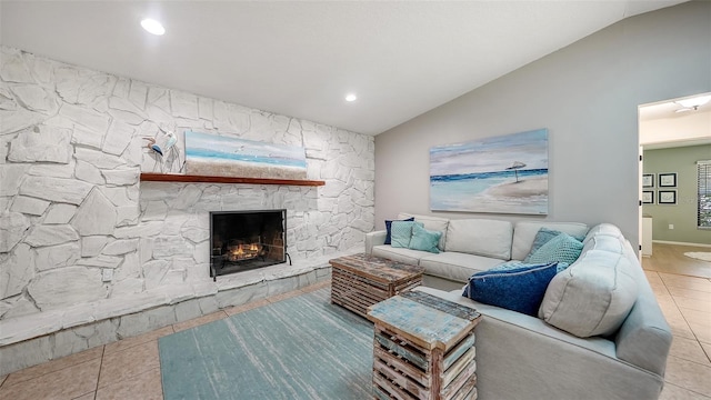 tiled living room with a fireplace and lofted ceiling