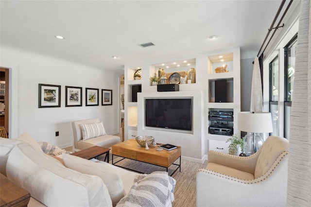 living room with built in shelves