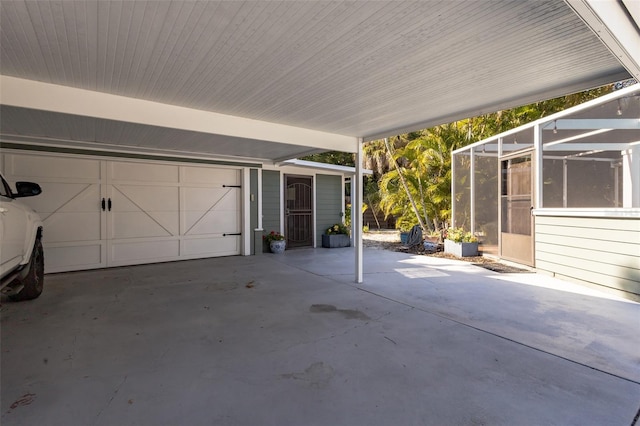 view of patio featuring a carport and a lanai