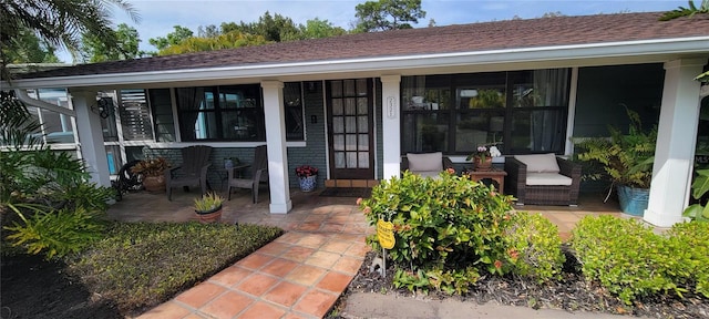 entrance to property with a porch