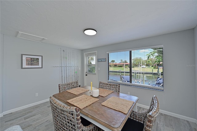 dining room featuring light wood-type flooring