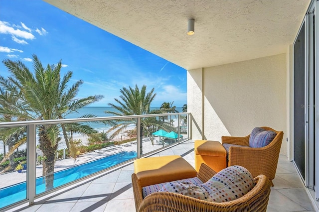 1800 Benjamin Franklin Dr Unit A304, Sarasota, FL 34236 - balcony with view of pool area and a sunroom