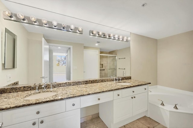 1800 Benjamin Franklin Dr Unit A304, Sarasota, FL 34236 - bathroom with a stall shower, double vanity, and a garden tub