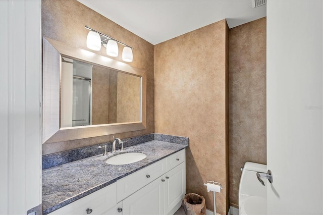 1800 Benjamin Franklin Dr Unit A304, Sarasota, FL 34236 - bathroom featuring vanity and toilet