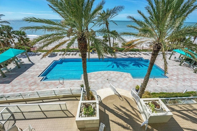 1800 Benjamin Franklin Dr Unit A304, Sarasota, FL 34236 - community pool featuring a patio area