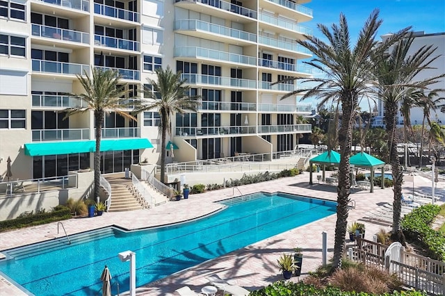 1800 Benjamin Franklin Dr Unit A304, Sarasota, FL 34236 - community pool featuring a patio area