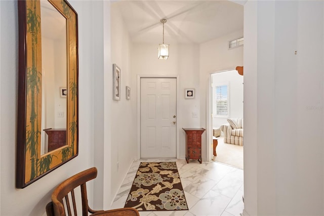 4209 Cascade Falls Dr, Sarasota, FL 34243 - entrance foyer with light marble finish flooring and baseboards