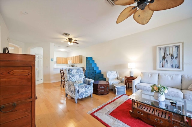 4209 Cascade Falls Dr, Sarasota, FL 34243 - living room with ceiling fan and light wood finished floors