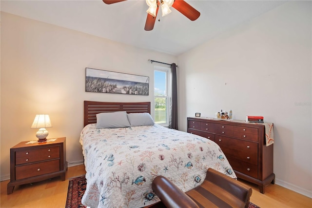 4209 Cascade Falls Dr, Sarasota, FL 34243 - bedroom featuring light wood-style floors, baseboards, and ceiling fan