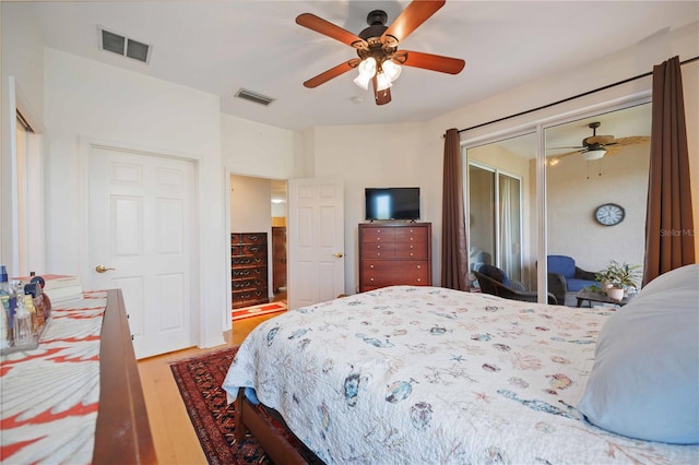 bedroom featuring wood-type flooring and ceiling fan